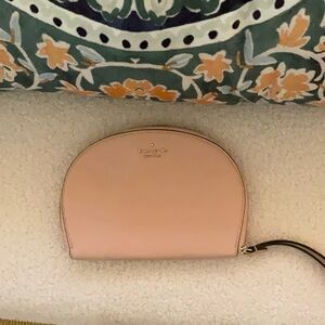 Kate Spade Pink wristlet with Modern Minimalist Design